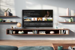 Stylish home entertainment setup with wooden shelves and Fire TV interface