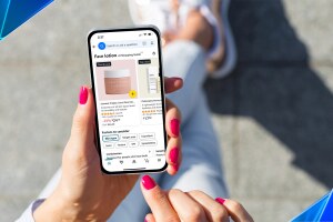 A smart phone with a screenshot of the Amazon shopping app.