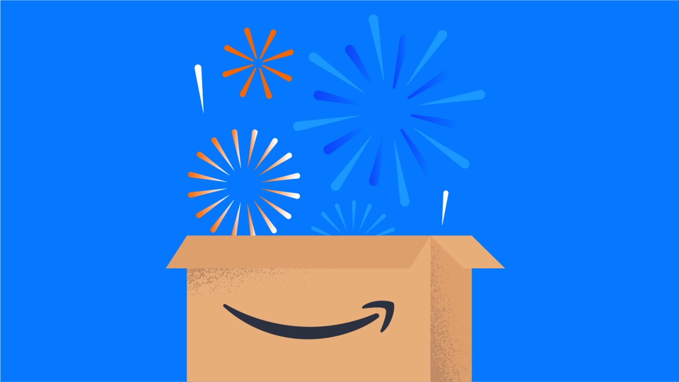 Amazon box with fireworks bursting above on blue background