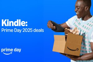 Happy customer holding Kindle and Amazon Prime box on blue background
