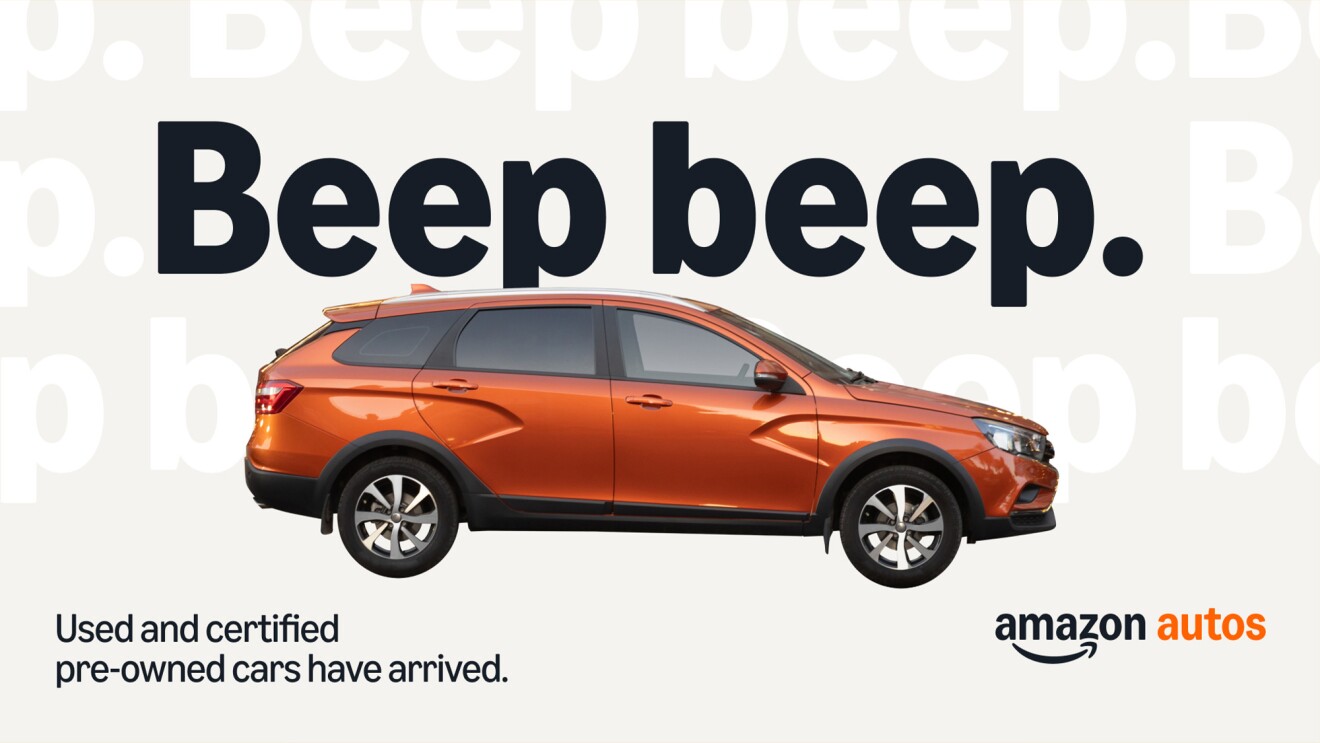 Orange SUV with 'Beep beep' text, Amazon Autos ad for used cars