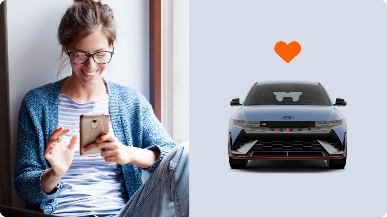 Woman smiling at smartphone next to image of Hyundai car with orange heart