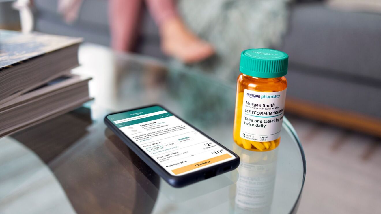 Amazon Pharmacy prescription and mobile app on glass table