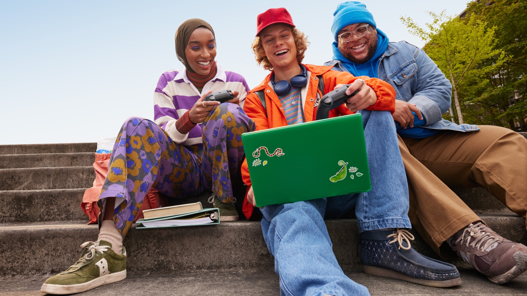 Young adults socializing with video games on stairs