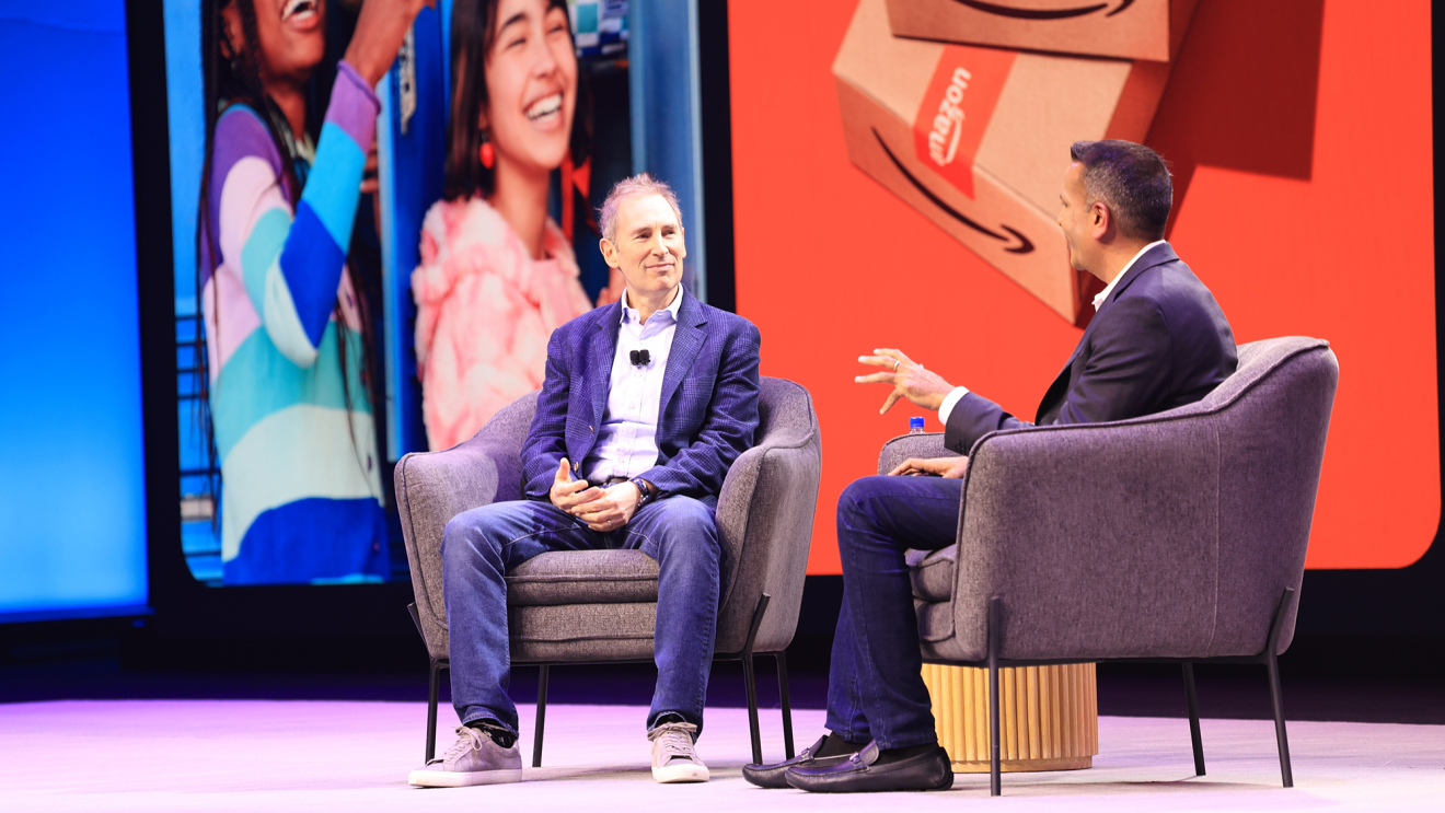 Amazon CEO Andy Jassy on stage with Dharmesh Mehta, VP of Worldwide Selling Partner Services, during a fireside chat at Amazon Accelerate 2025.
